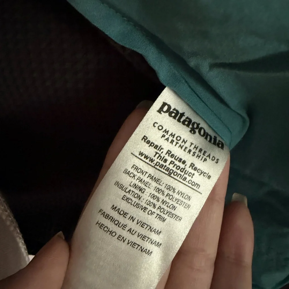 Patagonia Teal and Black Vest It also fits a women's size M